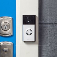 ring wireless doorbell installed on the door