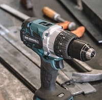 cordless drill placed in ground