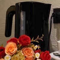 black electric kettle with flowers