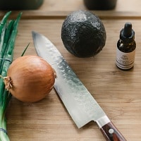 Knife on the table with vegetable